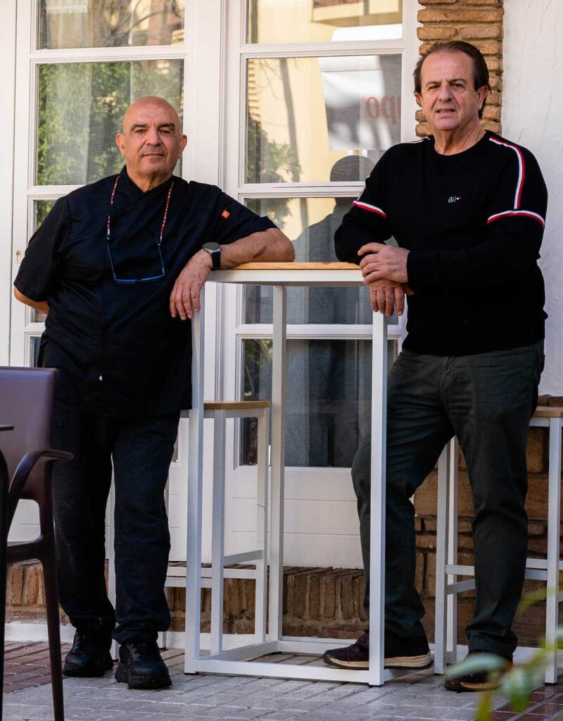 Diego and Pepe, owners of Freiduría Miraflores, at the restaurant entrance